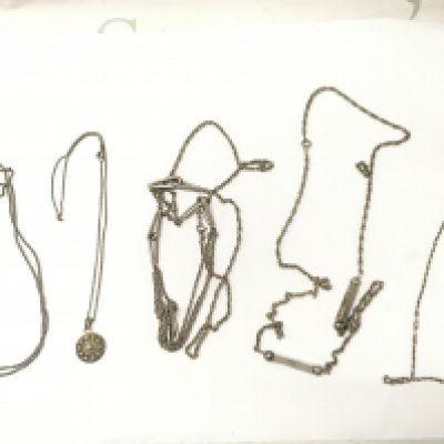 Five silver necklaces . 79g total weight Approx . Postage category A