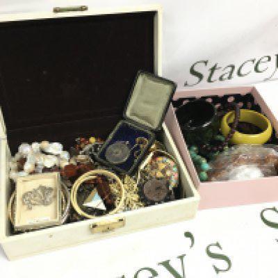 Two boxes of costume Jewellery including a marcasite brooch, lighters, silver case, bakelite necklace, Necklaces etc postage category B