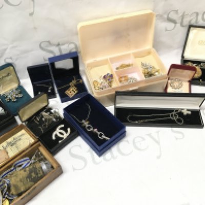A mixed collection of costume Jewellery including silver Jewellery, boxed Swarovski necklace Etc