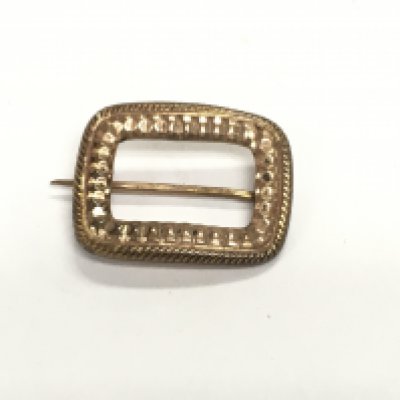 An unmarked gold buckle brooch. 1.61g