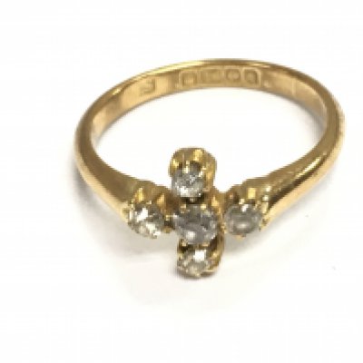 An 18ct gold ring set with diamonds. 3.53 and size N 1/2