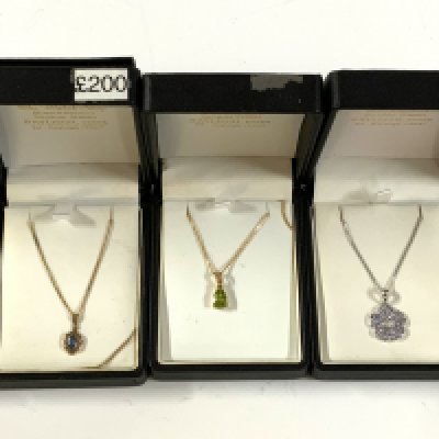 5 9ct gold stone set pendants and chains. (A)