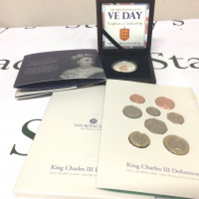 A Silver proof Five pound coin VE Day a set of King Charles III definitive coins and one other commemorative coin (3)