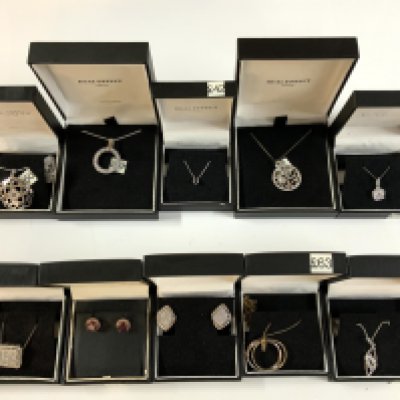 10 Real effect sterling silver and stone set pendants. (A)