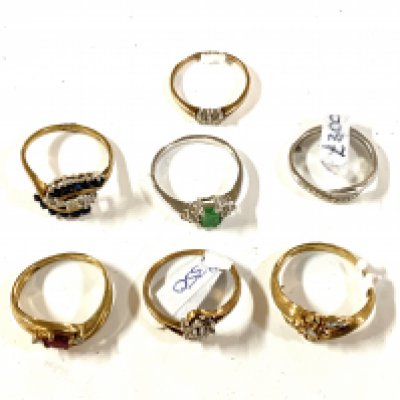 7 9ct gold and stone set rings. (A)
