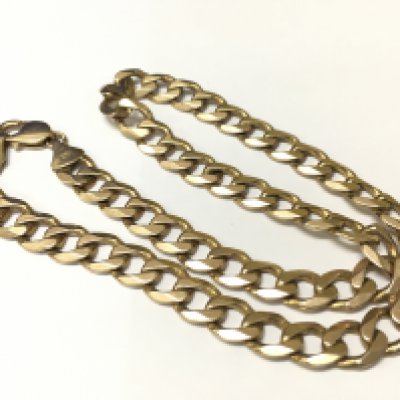 A heavy 9ct gold curb chain, length 18inches, Approx weight 54.72 grams.