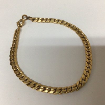 A slab sided 18carat gold bracelet marked 750 weight 6.5g