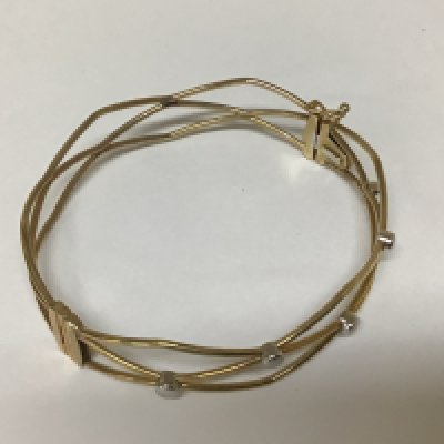 An Italian Modern design 9carat gold bracelet open link with white gold studs. 8.5g