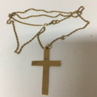 An 18carat gold cross and chain weight 9g