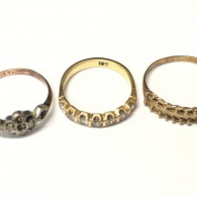 An 18ct gold rings row set with white stones and two other rings, Approx weight of 18ct gold ring 2.81 grams.
