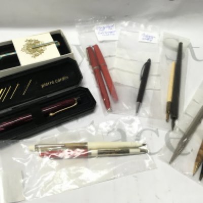 A Collection of pens including Buckingham palace biro, Pierre Cardin biro, dipping pens etc . Postage category B