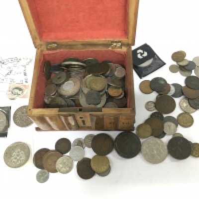 An olive wood box containing various coins. Shipping category D.