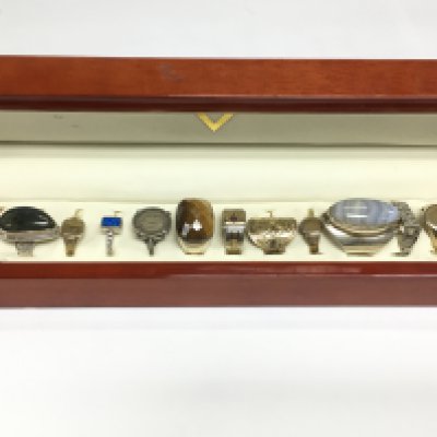 A collection of silver and gold on silver rings. Shipping category A.