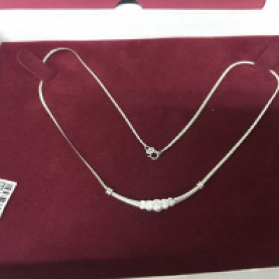 As new a white gold 9carat necklace in a fitted box H Samuels.