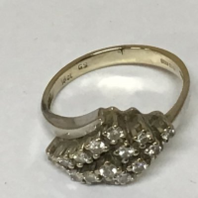 A white gold 18carat ring set with a pattern of diamonds. Weight 4g