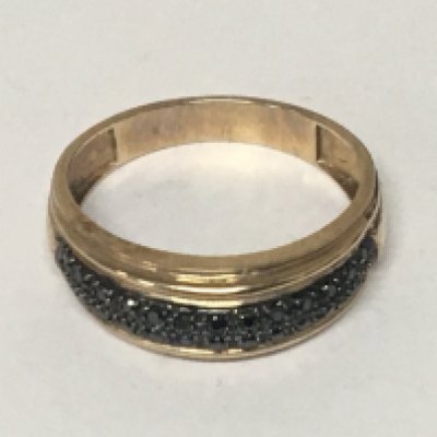 A 9carat gold ring set with a pattern of black diamonds. Weight 3g