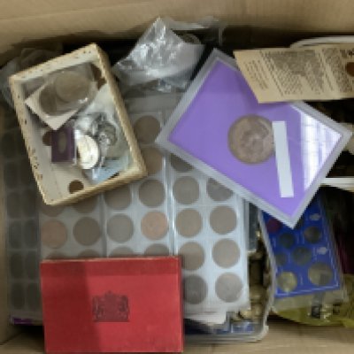 A large box of mixed British and world coinage.