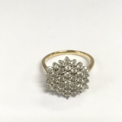 A 9ct gold diamond cluster ring, approx 4.8g and approx size Q-R. Shipping category A.