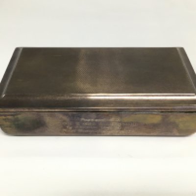 A silver cigarette box, approx length 16cm. Birmingham hallmarks. Shipping category B.