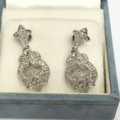 A pair of 9ct white gold Edwardian design illusion drop earrings.