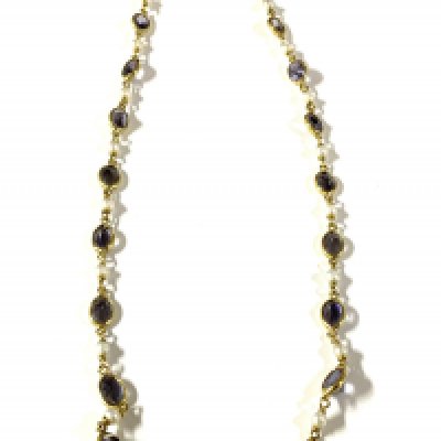 An 18ct trellis gold seed pearl and blue stone necklace. 45cm. Total weight 10.8g (A)