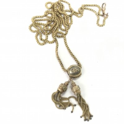 A Edwardian 9ct gold muff chain. There have been some repairs to the chain. 35.06g Postage B