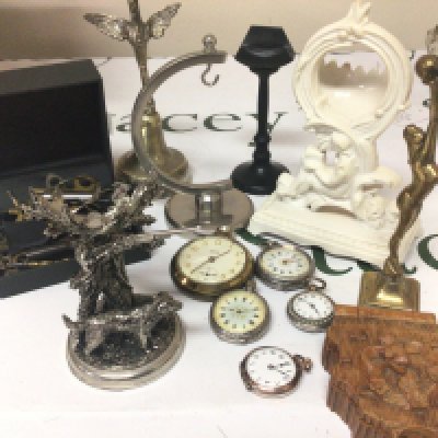 A Collection of Continental silver fob watches a collection of watch stands and a a mixed lot of watch keys.