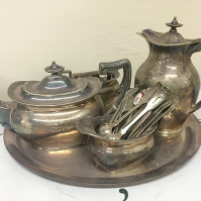 Silver plated tea tea set a condiment set silver and silver plated spoons.