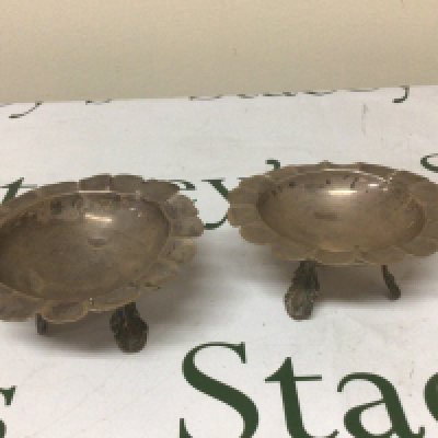 A pair of white metal dishes possible Mexican. Weight 235g