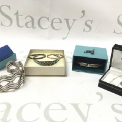 A mixed collection of silver Jewellery including a Mexican bracelet, necklace Etc. Postage category B