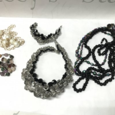 Necklaces, bracelets, postage category A