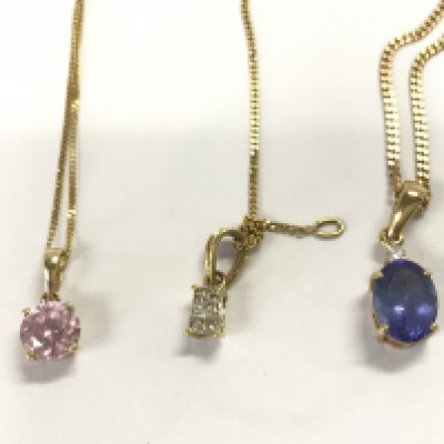 Three 9ct gold chains each set with a coloured stone including diamonds and Tanzanite. 8.05g total. Postage A