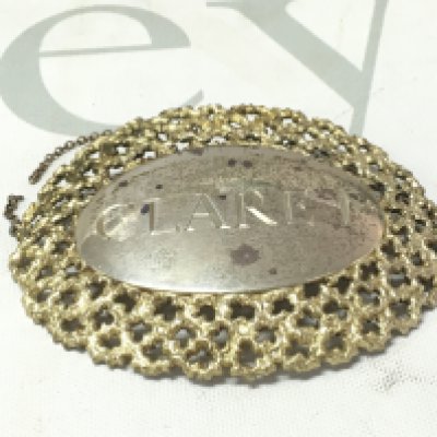 A silver claret decanter label by Stuart Devlin. Postage A