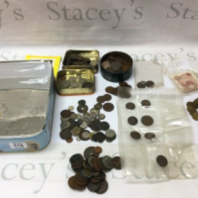 A mixed collection of British and commonwealth coinage. Postage B