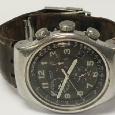 A Swatch irony gents stainless steel 4 jewel watch with leather strap. Postage category A