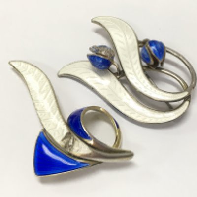 Two damaged Sterling silver Norwegian enamel brooches . Postage category A