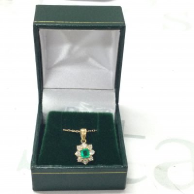 18ct yellow gold pendant set with a square step-cut emerald surround by RBC diamonds, on an 18ct yellow gold chain. Emeralds 0.34ct, Diamonds 0.52ct