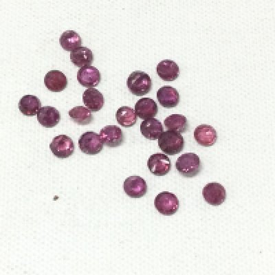 Two parcels of uncounted round-cut rubies totalling 4.71ct