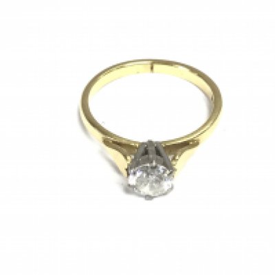 An 18ct gold solitaire diamond ring. Diamond approximately 0.85ct. Size M 1/2 and 3.22g. Postage A