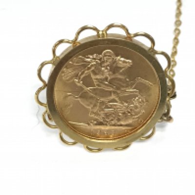 1968 full sovereign in a 9ct brooch. 10.74g