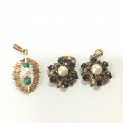 Three 9ct gold pendants set with pearls and other stones. 7.33g Postage A
