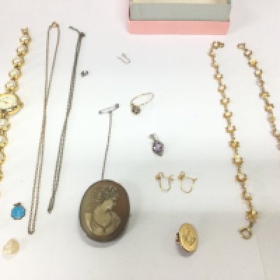 A collection of assorted items including broken 18ct gold cufflink 3.09g a cameo brooch and two silver gilt bracelets. Postage B