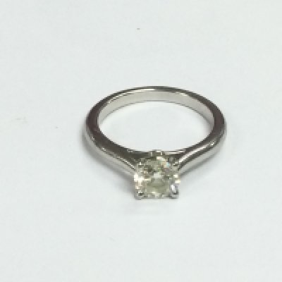 A Cartier 950 platinum diamond ring set with a 1.06ct round brilliant cut solitaire diamond. Colour H, Clarity VVS1, approx 6.28ct and approx size N-O. Comes with all outer packaging and GIA certificate. Shipping category B.