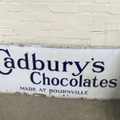 Cadbury chocolates made at bournville enamel sign 58 x 23 inches approximately
