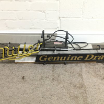 A miller draft neon sign A/F 43 inches wide.