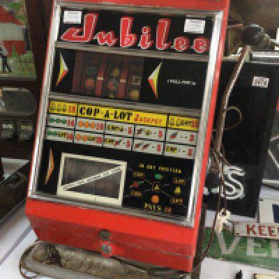 A Vintage Mechanical one arm bandit fruit machine The Jubilee set up for decimal 1p play jackpot 200 coins electric illumination. With case key. In need of refreshing.
