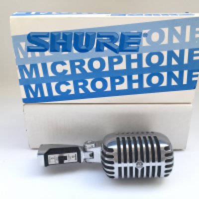 A boxed Shure 55SH Series II microphone.