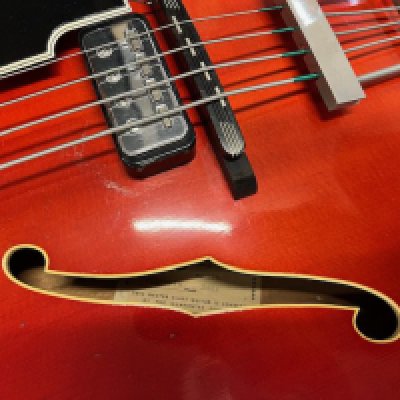 A 1964 Hofner Verithin Bass Guitar. Semi sold body with all original parts and finish, Label still in place and serial number is 316. Condition very good + overall consistent with age and use. Comes with original light oatmeal Hofner fitted case. Wear and marking to case outer, extensive wear to handle.