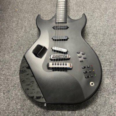 A mid 1980's Bond Electraglide electric guitar in very good condition with case and power supply. Made out of carbon fibre weighing in at around 4 kg - the most unique feature is the stepped " fretboard - no metal frets - the strings are fretted against the sawtooth ridges. Now increasingly rare especially in all original condition. Notable users of the Electraglide were Mick Jones, The Edge, Will Sergeant, John Turnbull and Dave Stewart (he's pictured with one in the 1984 Bond catalog). Ex Clash Guitarist Mick Jones is known to have used a Bond Electraglide with his band Big Audio Dynamite in the mid-1980s The Edge used his extensively on The Joshua Tree, including the solo on "One Tree Hill", as well as on "Exit," and "Mothers of the Disappeared". Will Sergeant, John Turnbull and Dave Stewart were also Electraglide users. Electrically everything works as it should including the LED display and the stepped fretboard and neck is in very good condition.