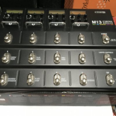 A boxed Line 6 M13 stompbox modeller.